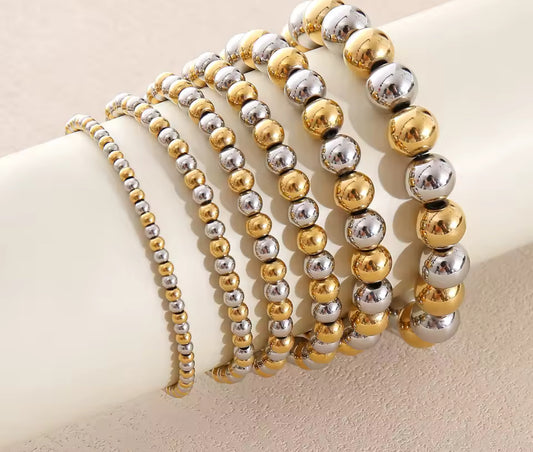 Pulsera bolitas bicolor