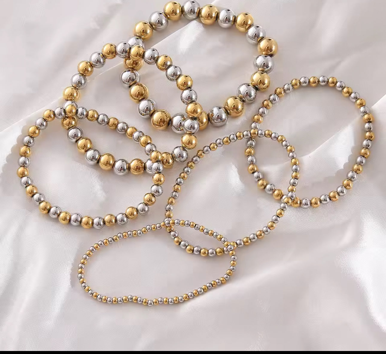 Pulsera bolitas bicolor