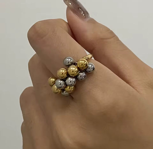 Anillo bolitas bicolor