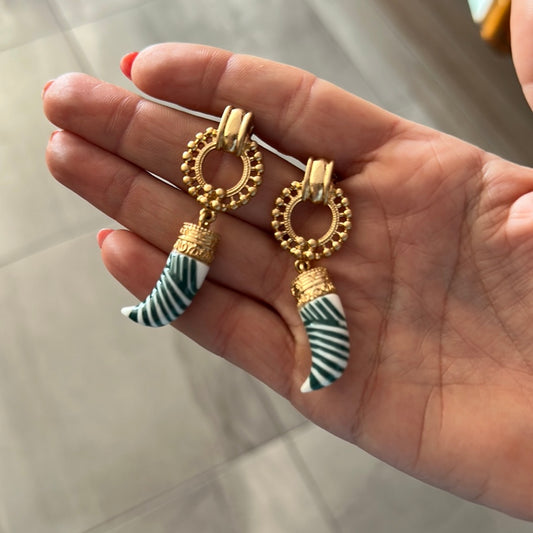 Aretes cuernos
