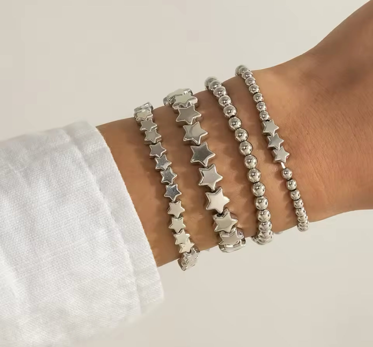 Conjunto pulseras estrellas