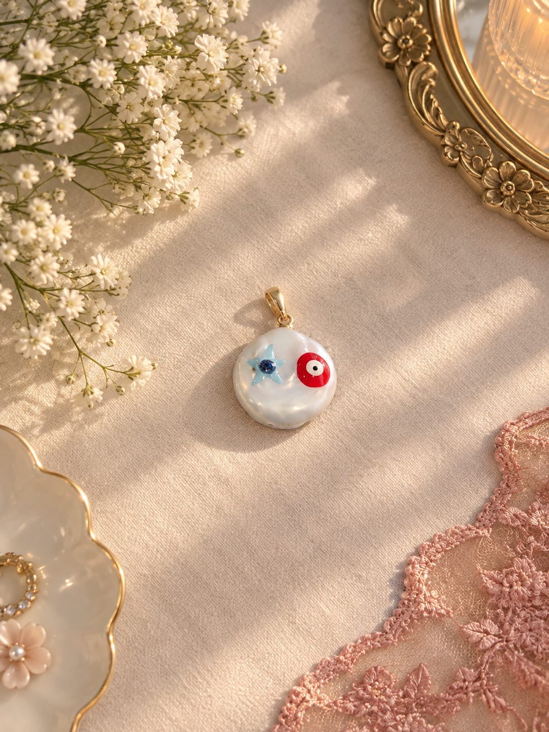 DIJE PERLA CON OJO