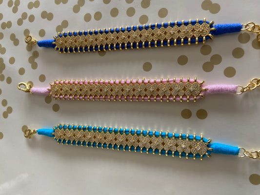 BRAZALETE FLOR DORADA