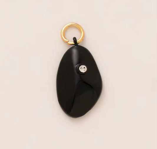 Dije piedra negro