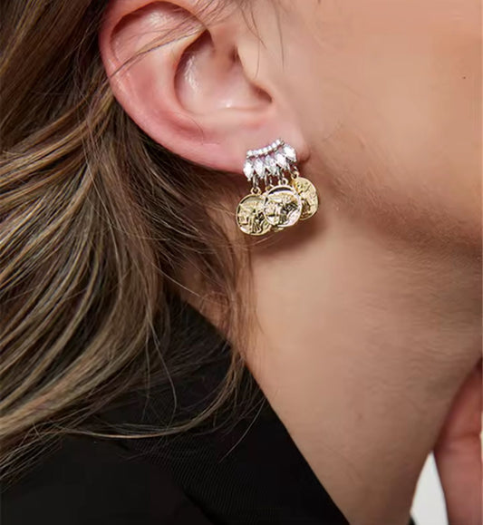 Aretes monedas