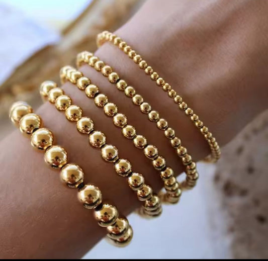 Pulsera bolitas dorada