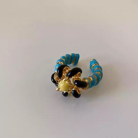 Anillo flor azul